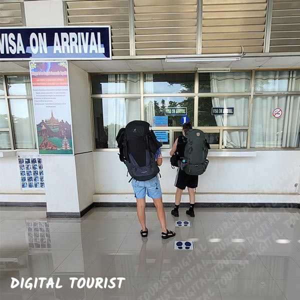 Backpackers collecting Huay Xai Laos Visa on arrival